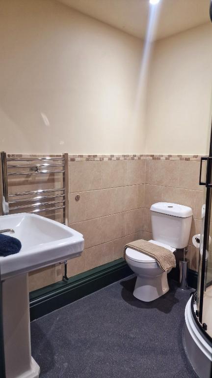 The Classic Room — en-suite bathroom alternate angle with heated towel rail